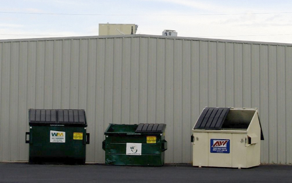 Are hazardous materials allowed in regular dumpsters?